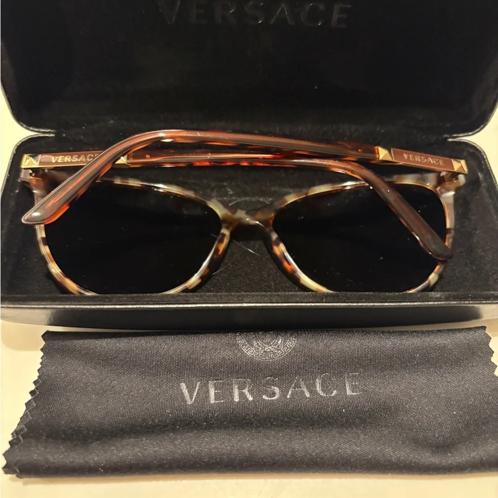 Versace sunglasses featuring